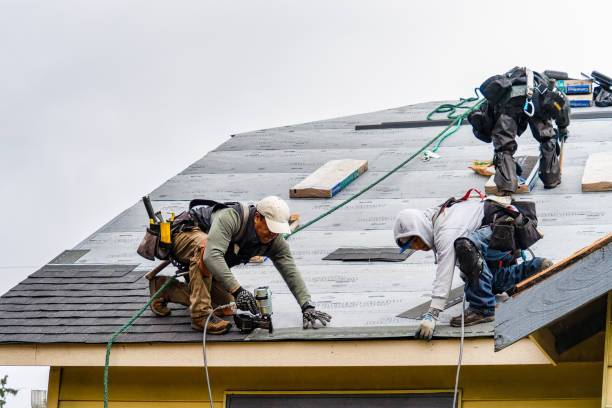 Professional Storm Damage Roof Repair technician working in Somersworth, NH